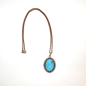 Large oval turquoise cabochon pendant necklaces in fancy copper