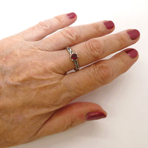 Brilliant-cut garnet solitaire sterling ring