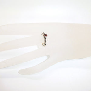 Brilliant-cut garnet solitaire sterling ring