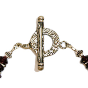 Garnet & antiqued sterling silver bead bracelet
