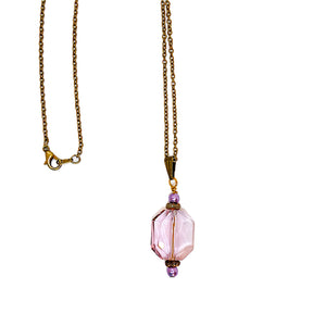 Large faceted oblong lavender-rose crystal pendant on chain necklace