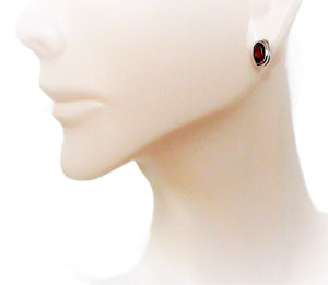 Garnet oval fancy-cut sterling silver post stud earrings