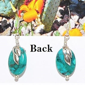 Oval turquoise with two-sided sterling leaf bail on French wires
